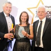 From left, Joe Makepeace, Jacqui Young and M.C. Bob Williams. Jacqui won Primary Head Teacher of the Year