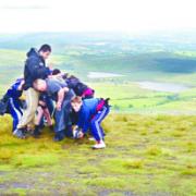 SCRUM UP: The boys play on Pendle Hill