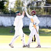 clitheroes neil bolton shows his delight on getting 100 runs with a high five from clitheroe pro Janaka Guneratne .during the  ribblesdale league cricket match between read and clitheroe at read cc on sun 6th sep 2015..Self billing applies where