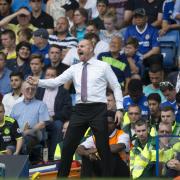 ENCOURAGEMENT: Dyche urges his side on at Stamford Bridge