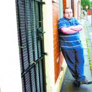 SAFE AS HOUSES? Daniel Hillary is the last remaining resident on Highfield Road, Blackburn
