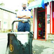 Darwen shopkeeper's fury over waste bin fires