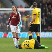 Burnley's Jeff Hendrick reacts to his tackle on Watford's Jose Holebas