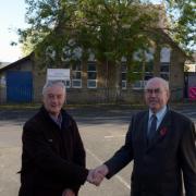Councillors Charlie Briggs and Tony Martin outside Burnley's Gannow Community centre when it was saved.