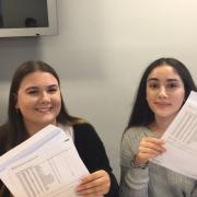 GCSE results day at Accrington Academy. From left, Rebekkah Pickup and Kelly McDonald celebrate.