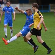 Ramsbottom United's Kyle Brownhill in action in the win over Prescot Cables