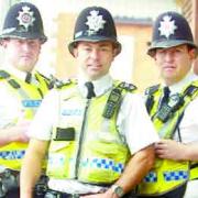 BRAVERY: PS Alan Clayton, with PC Leo Noctor (left) and PC MIke Smith
