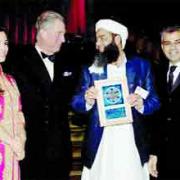 THANKS YOUR HIGHNESS: Ishtiaq Mohammed receives the award from Prince Charles as Princess Badiya and Sadiq Khan MP look on