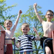 Cooper Boyle, 6, with his brothers Carter, 4 and Caiden, 9, about to use the slide