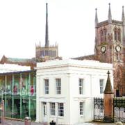 TRANSFORMED: Blackburn's historic Cathedral and, in the foreground, the sensitvely restored Waterloo Pavilions in the centre of the town