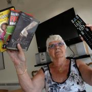 Showley Court, Salesbury residents not at all happy as they unable to play dvd's pictured here is resident June Mercer with a blank screen.