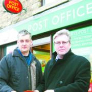 SUPPORT: Greg Pope (right) with Coun. Graham Jones outside St Hubert's Post Office in Great Harwood
