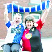 GAME ON: Wendy Howarth and son Robert, 12, with her dad’s 59-year-old Blackburn Rovers scarf
