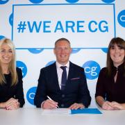 Signing On: CG Managing Partner Stacey Turner (left) and Louise Myers with Andy Dunn