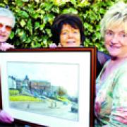SCENE: Local painter John Chapman with Carole Field and Joan Egan. John's picture is to be auctioned for the Graham Gardner Intensive Care Fund. The fund is hoping to raise around 50,000