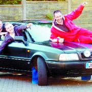 HOMAGE TO CATALONIA: From left, Lee Harrison, Alban Horrocks and Paul Blackburn with their Audi ‘banger’
