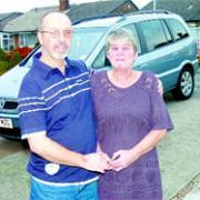 NO HARD FEELINGS: Malcolm Gerrard and wife Avril who he reversed into while chasing a gang of youths
