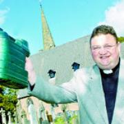 CALL: St Leonard's vicar Dr James Garrard who successfully asked his parishioners to be more eco-friendly