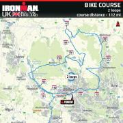 The map of the new Ironman route (above) and cyclists tackle the original one last year (left)