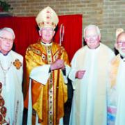 Fathers Norman Arkwright, Myles Moriarty and Reginald Riley with the Right Rev Tom Burns, to mark the 50 year anniversary of their ordination