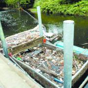 LITTER TRAPPINGS: The blocked litter barrier on the River Darwen became a flood hazard after not being cleaned