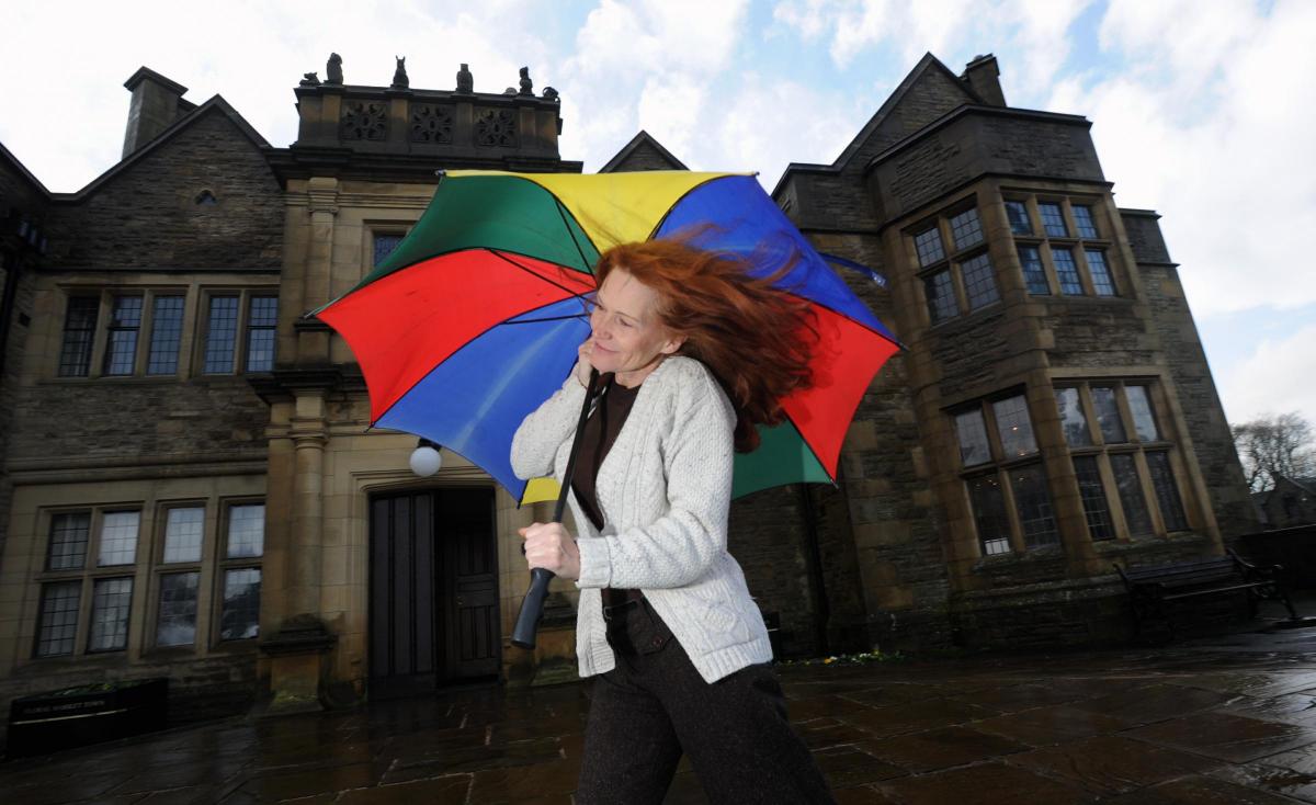 Heather Ashton-Rowell (gallery assistant) battles the winds at Haworth Art Gallery in Accrington