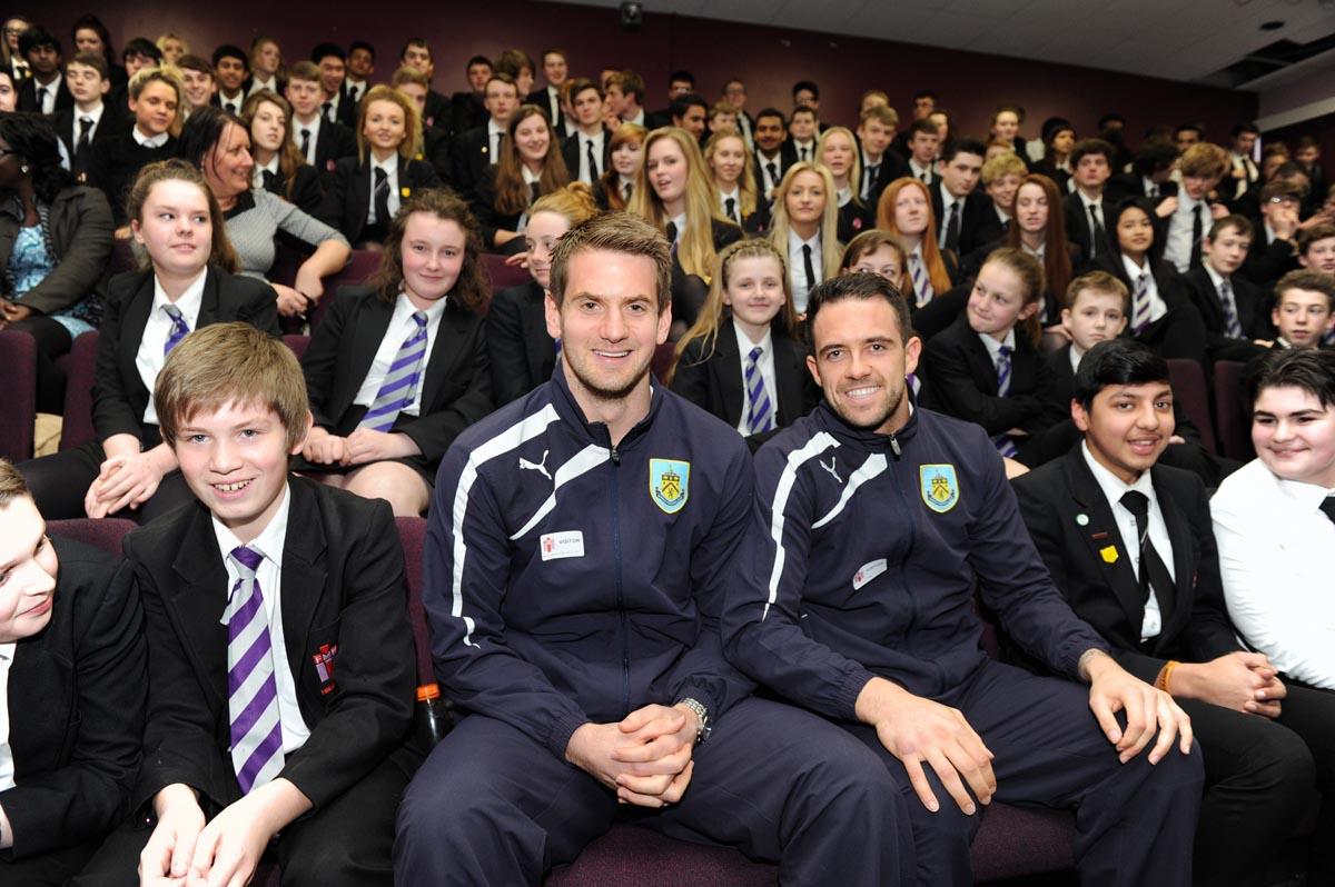Burnley Co-Chairman John Banaszkiewicz visits his old school in Colne. Also present at Fishermore High School were first team coach Ian Woan and players Danny Ings and Tom Heaton.