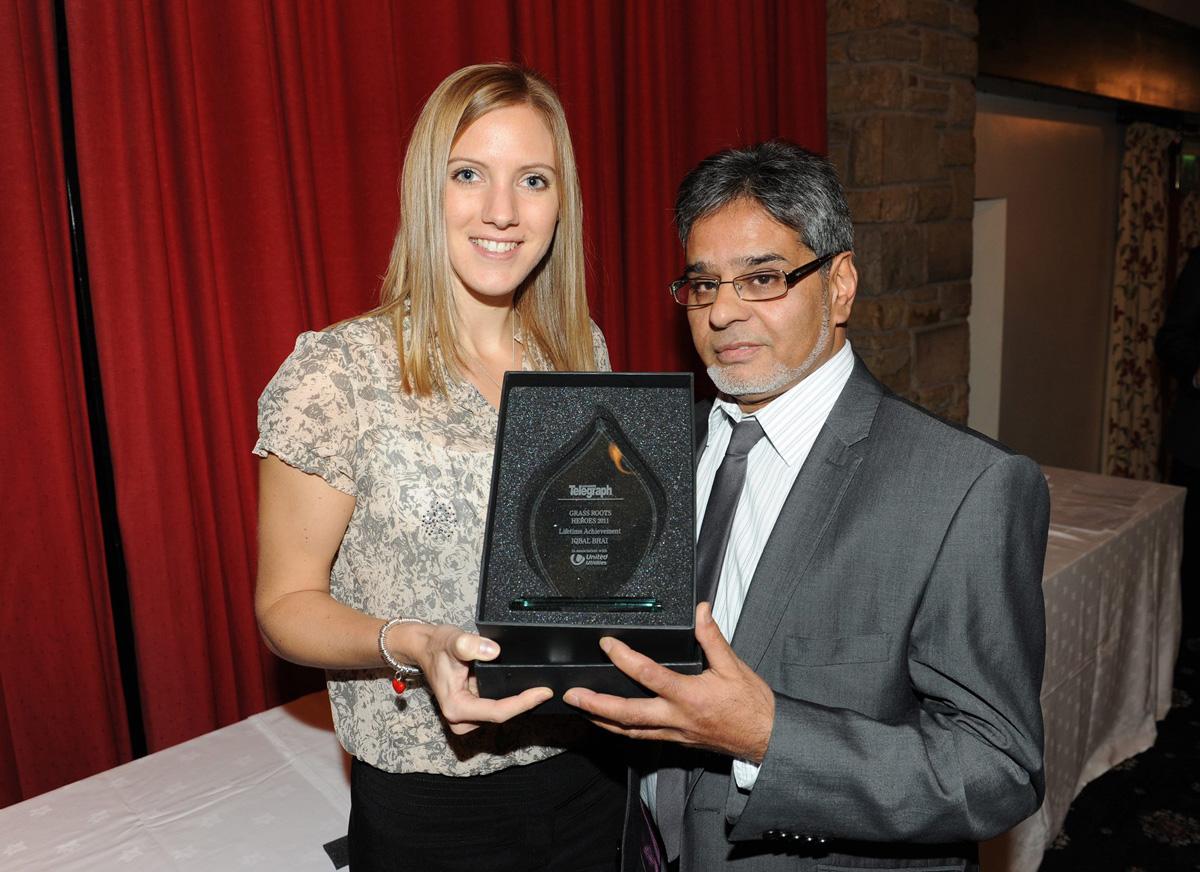 Laura Massaro presents Iqbal Bhai with the Lifetime Achievement Award, during the Grassroots Awards 2011.