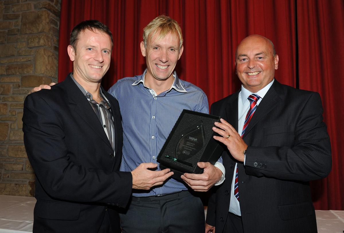 Peter Jones (centre) accepts the Senior Sports Personality Award from L/R Kevin Gallacher  and Sponsor Garry Edwardson of United Utilites, during the Grassroots Awards 2011.