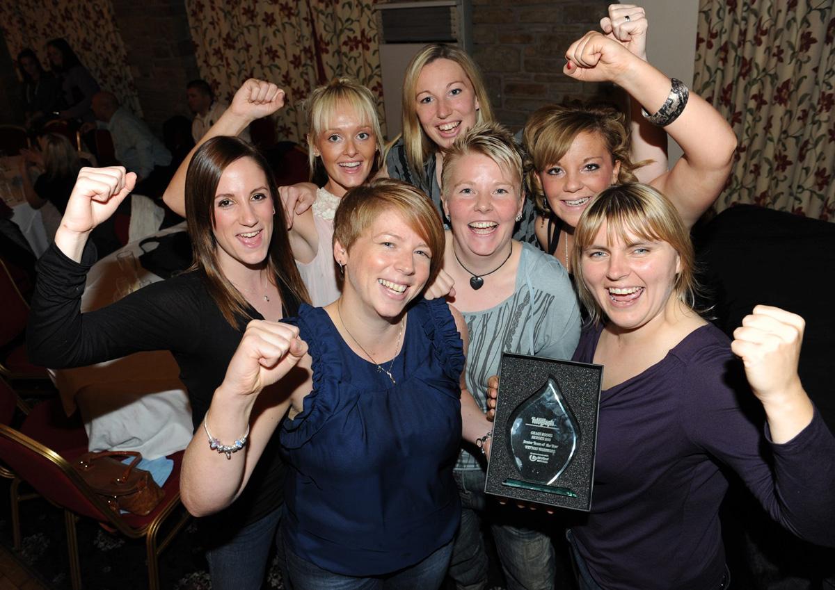 Captain Debbie Slater (front left) is joined by Members of the Witton Warriors ladies Hockey Team as they celebrate winning the Team of the Year Award in the Grassroots Awards 2011.