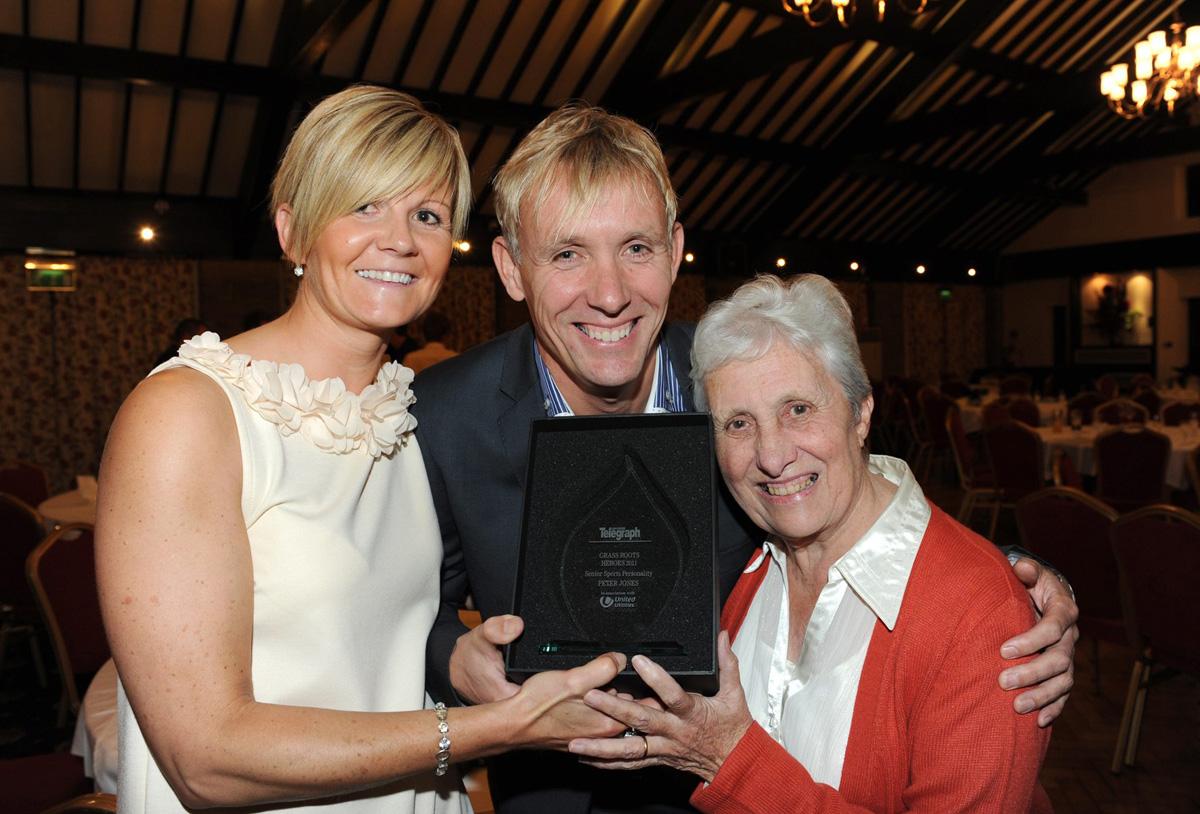 Peter Jones winner of the Senior Sports Personality of the Year celebrates with his wife Nikki Jones (left) and his Mum Barbara Jones (right) after the Grassroots Awards 2011.