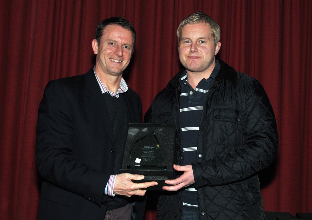 Kevin Gallacher presents Darren Wright of Burnley Community Trust with the Unsung Hero Award 2012.