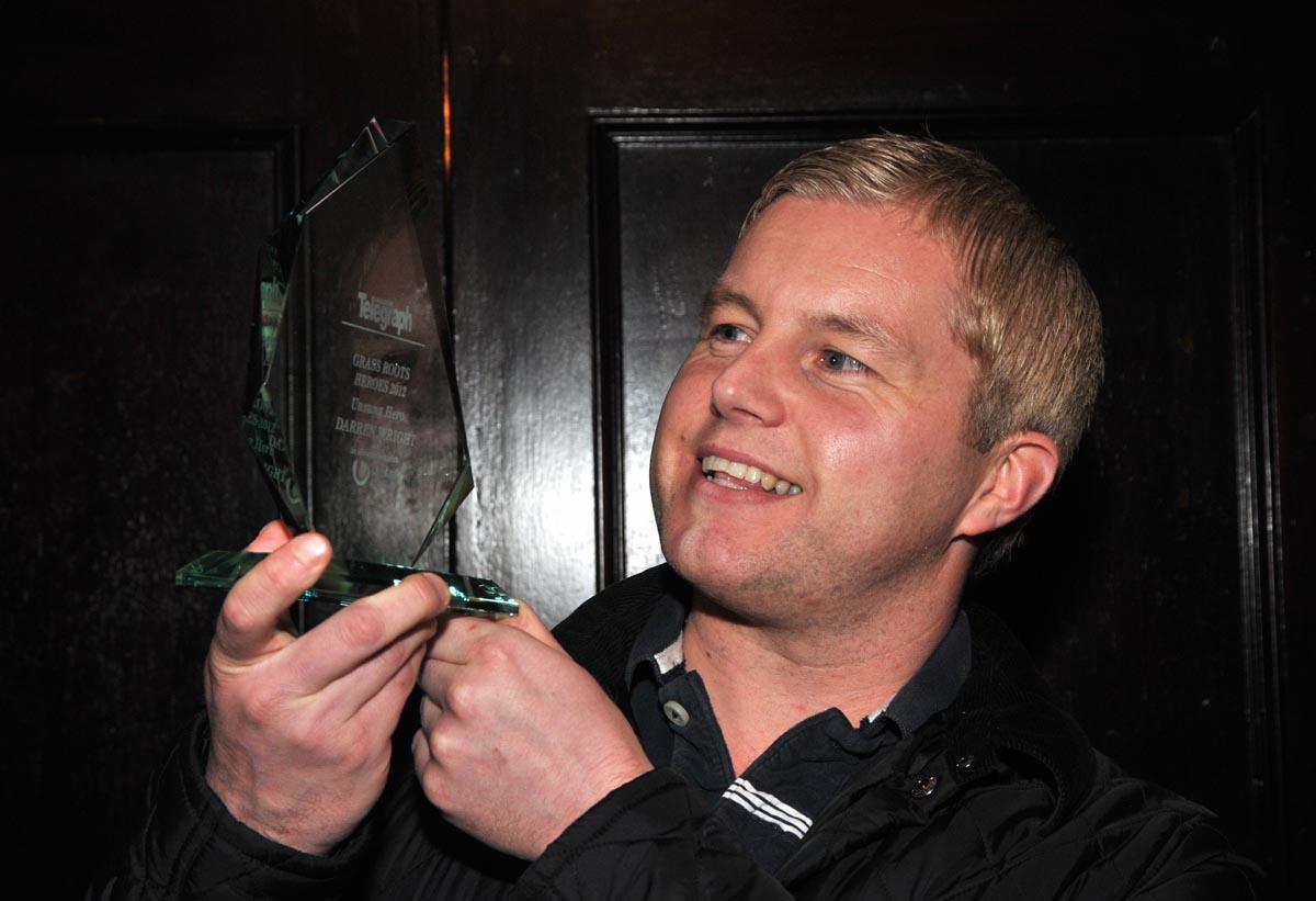 Darren Wright of Burnley Community Trust with the Unsung Hero Award 2012.