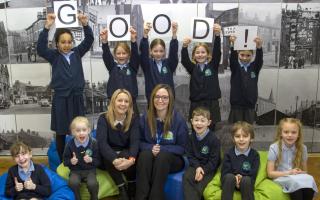 Deputy Headteacher at Northern Primary School Sandra Melvin (front centre) and SENCO Zoe Stott with pupils celebrating their school’s Good Ofsted inspection