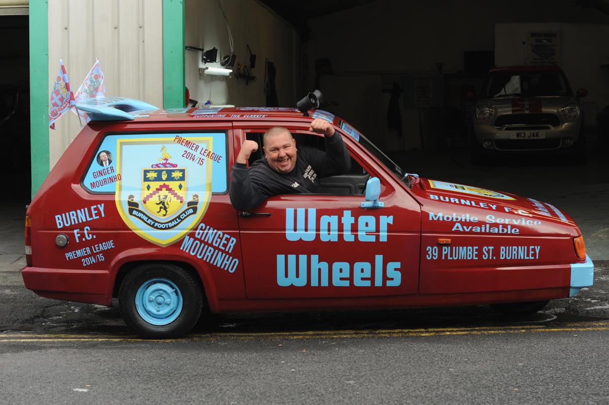 Mark Holmes from Water Wheels Valeting on Plumbe Street in Burnley has done up his claret and blue Robin Reliant for this season to celebrate Burnley being in the premiership