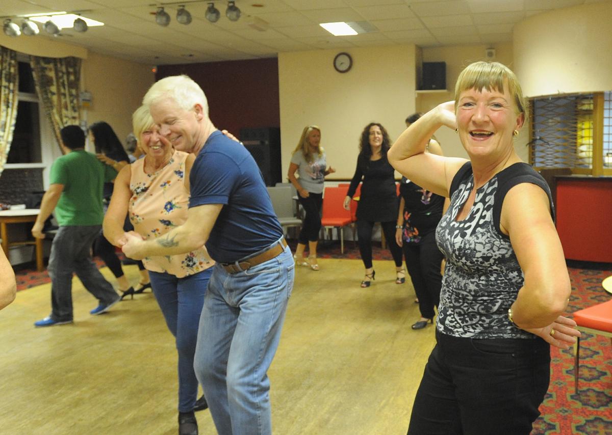 People take part in the Sweet Salsa Cuban Salsa Dancing Lessons at Longridge Conservative Club
