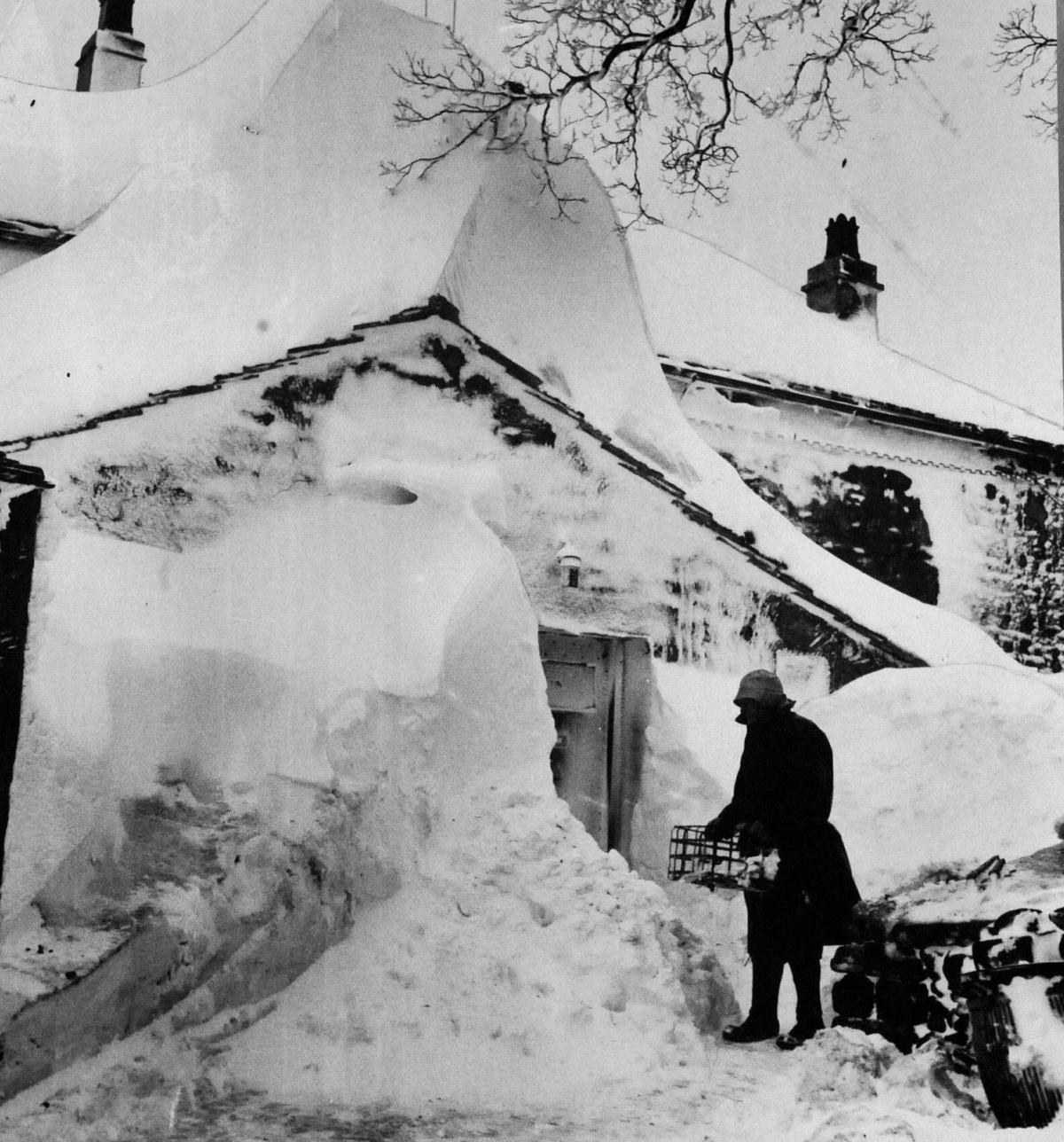 WHITE-OUT: Heavy snowfall making everyday life difficult at Overtown, Burnley, during the downfall in February 1963