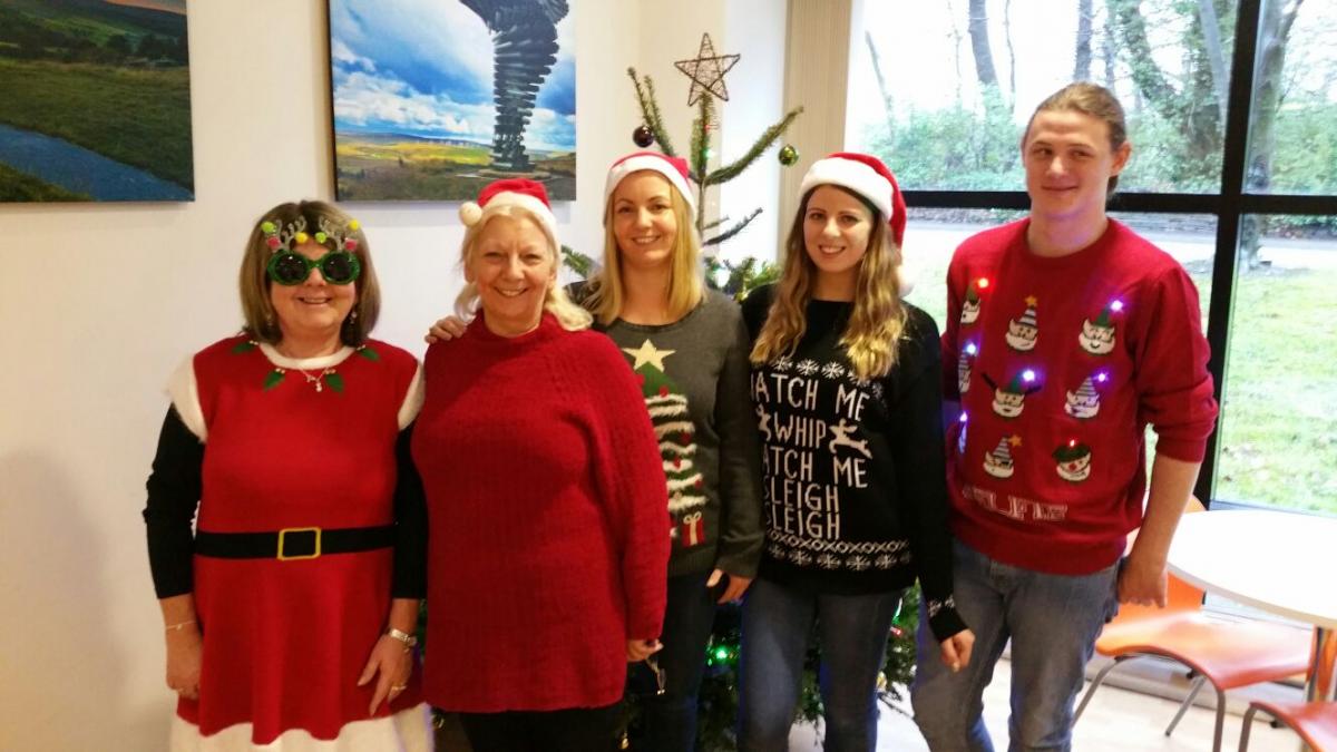 Some of the staff from here at the Chamber wearing our Christmas Jumpers for Text Santa