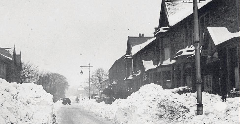 WINTER: Deep drifts in Revidge Road,
Blackburn, during the heavy snowfall of
January 1970