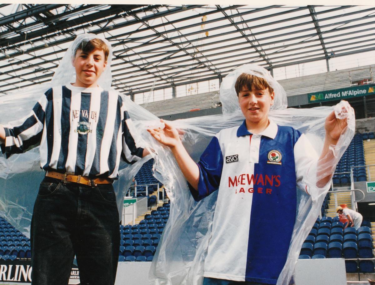 Brothers David and Gavin Edmodson try shower macs in 1993.