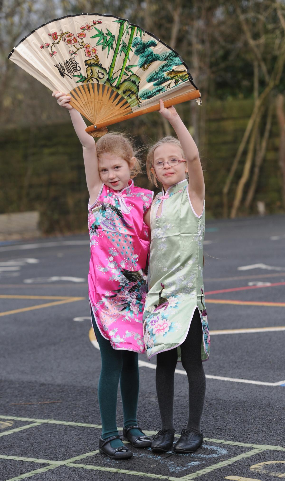 Children in Year 1 and 2 at Padiham Green Primary school take part in Chinese activities in the run up to Chinese New Year and also because the school is linked to a school in Quingdao in China.
Pictured are Tia Davies and Verity Bleasedale (