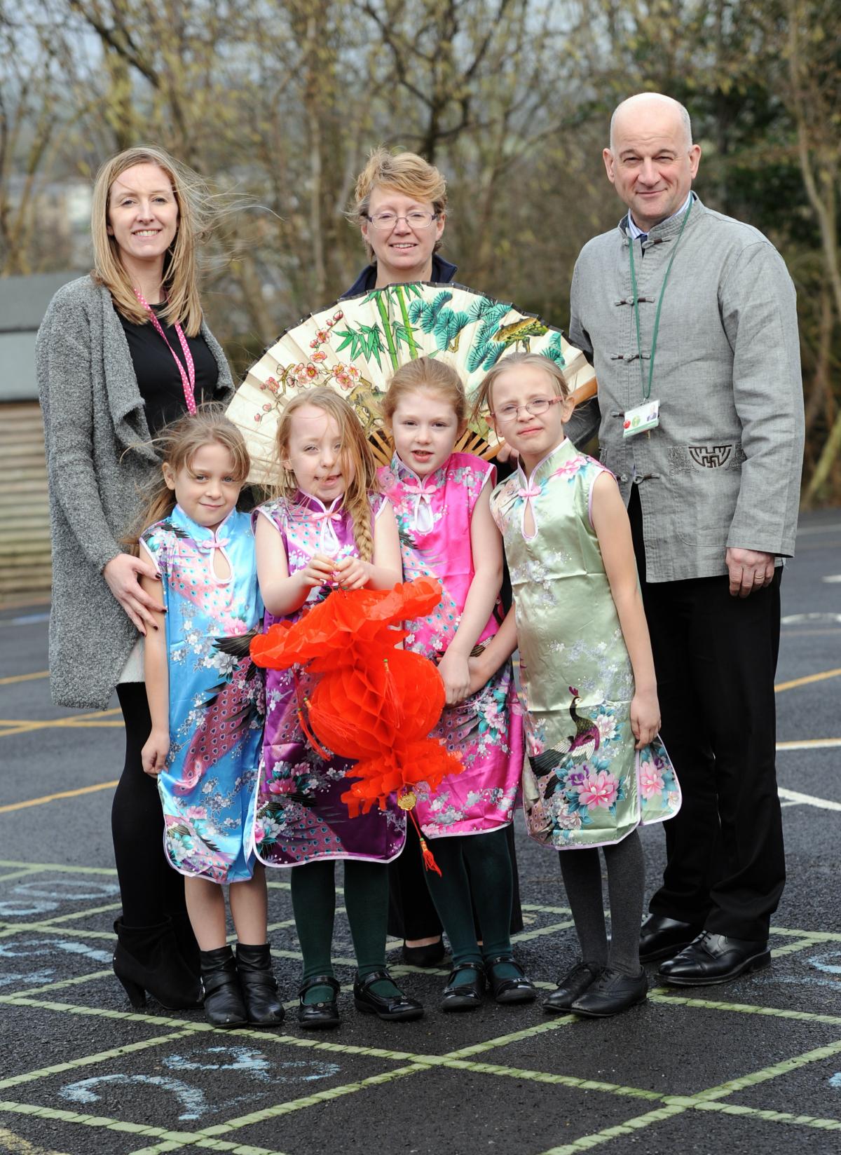 Children in Year 1 and 2 at Padiham Green Primary school take part in Chinese activities in the run up to Chinese New Year and also because the school is linked to a school in Quingdao in China.
Back L-R are year 2 teacher Claire Edwards, Chair of Governo