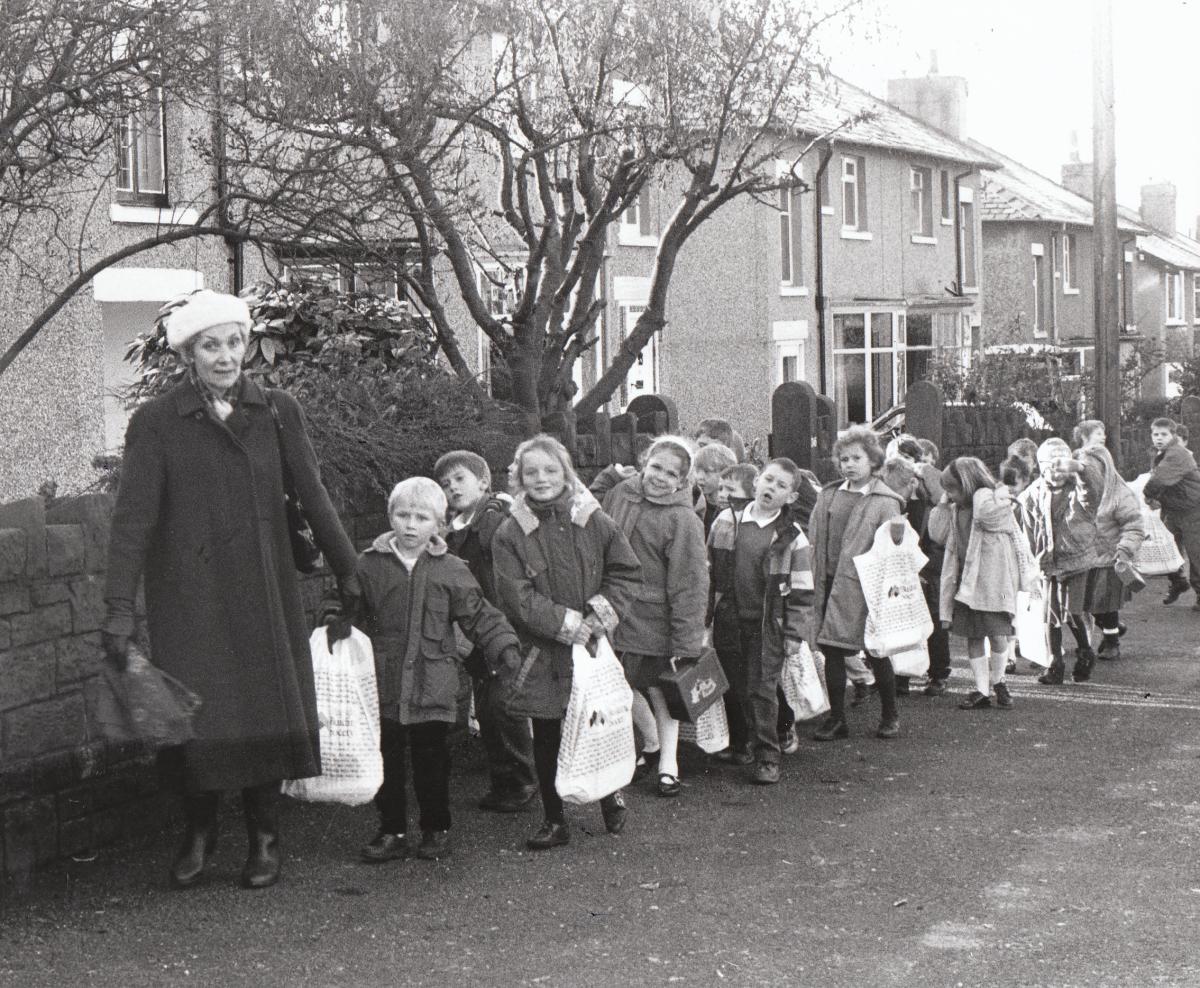 Pupils of St Johns CE Nelson leave their old premised on Barkerhouse Road for the new building on Trent Road