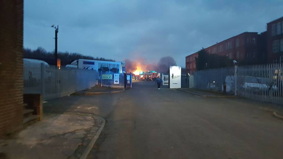 Fire involving wooden pallets at industrial estate