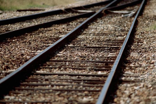 Woman rescued from railway line