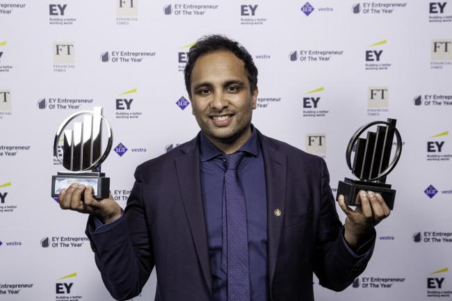 Imran Hakim with his two entrepreneurial awards