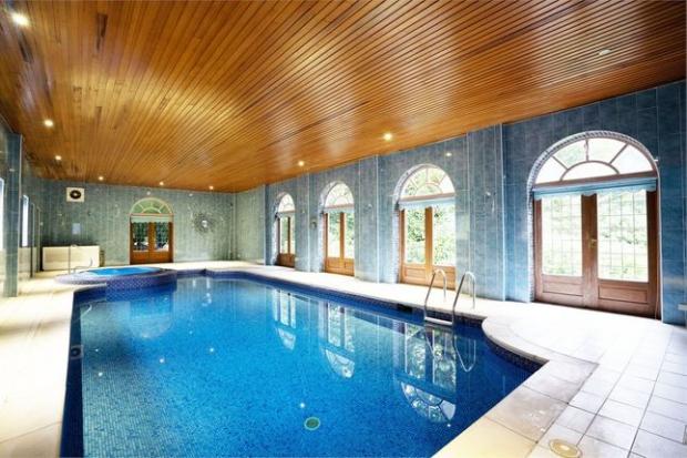 Lancashire Telegraph: The property's swimming pool (Photo: Zoopla, Express Estate Agency)