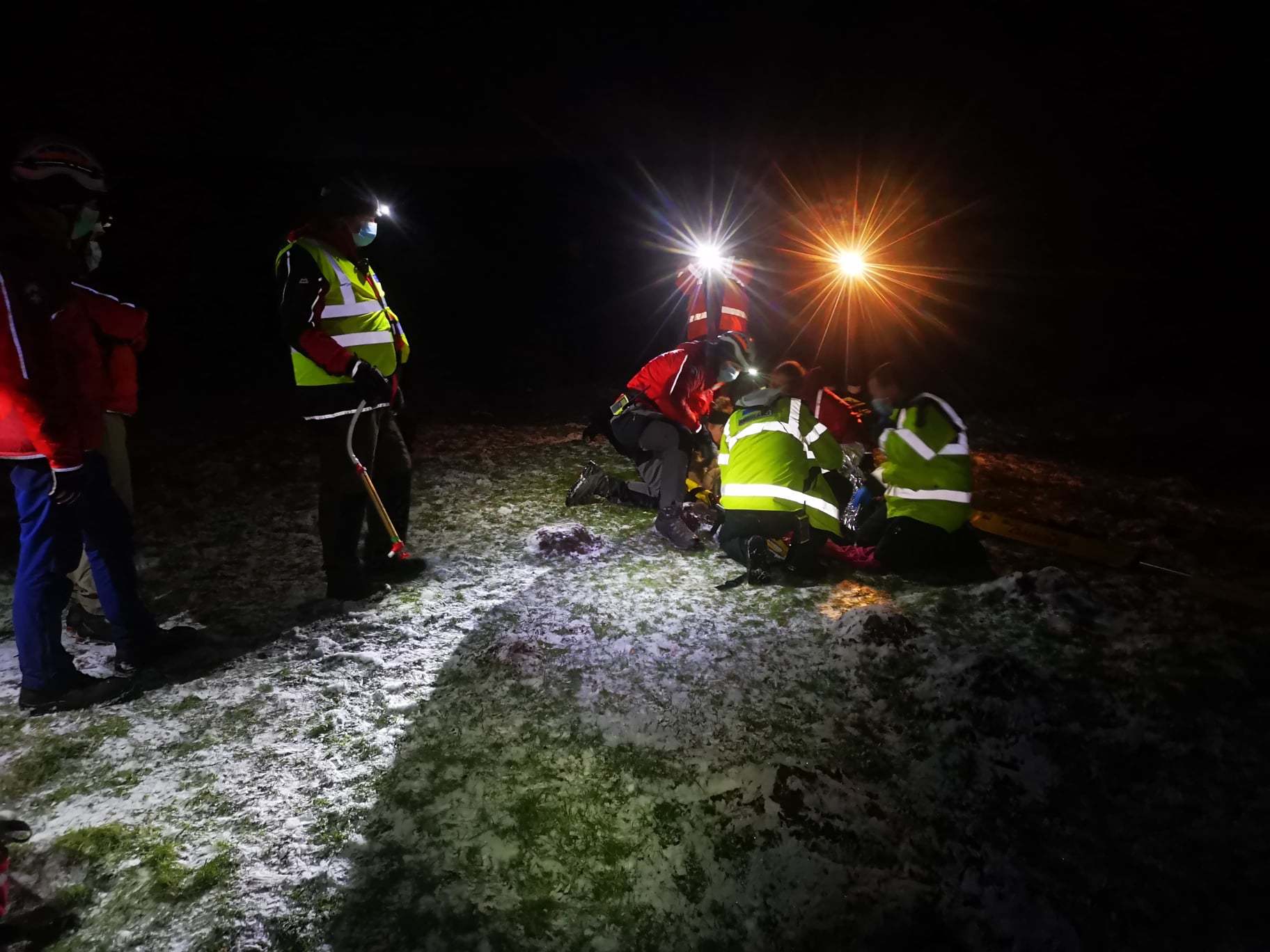 Bowland Pennine Mountain Rescue Team assisting a woman who was injured whilst sledging