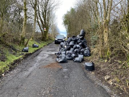 The bags were dumped on Cuckstool Lane in Fence, and one resident believes they are full of weed