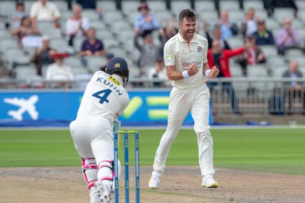 James Anderson celebrates his 1,000th wicket. Picture: Barry Mitchell
